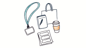 Marker doodle of a conference lanyard and badge, a notebook, a coffee cup, a schedule and a tote bag